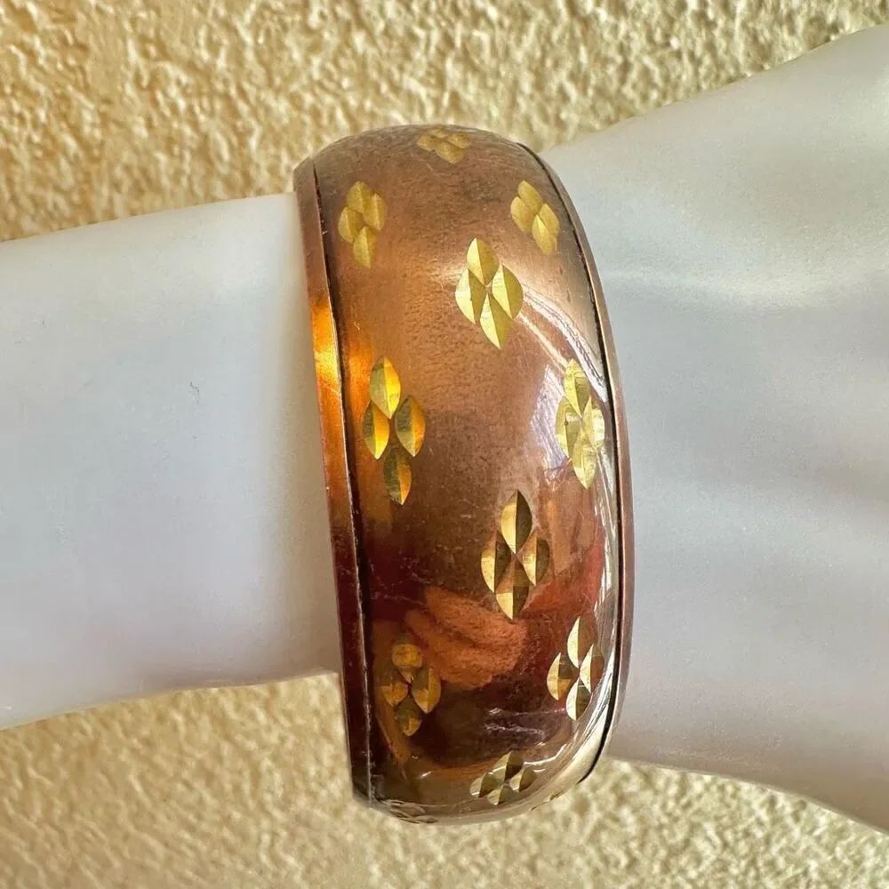Copper tone bangle bracelet